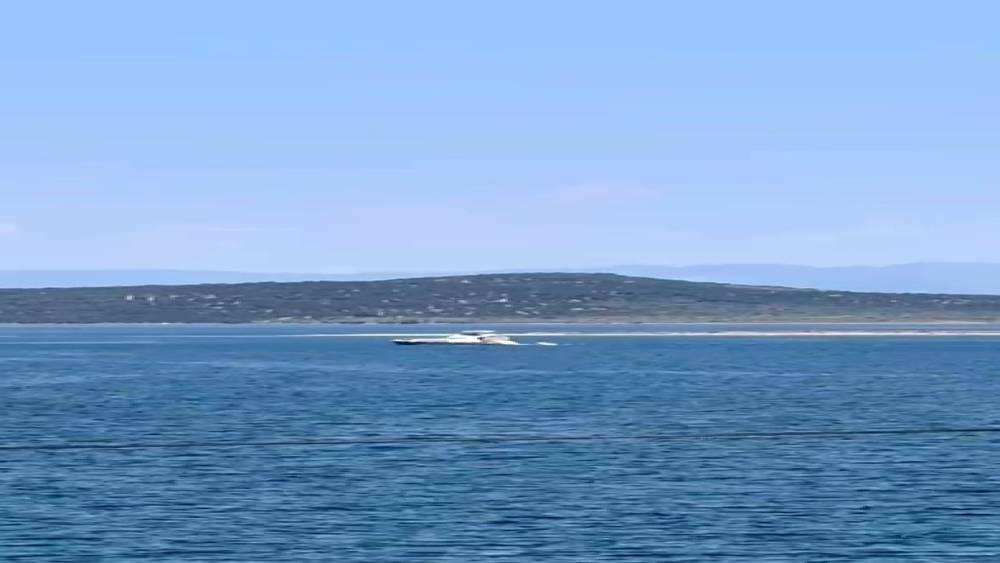 Ayvalık&rsquo;ta denizde kaybolan gen&ccedil; i&ccedil;in arama kurtarma &ccedil;alışmaları s&uuml;r&uuml;yor
