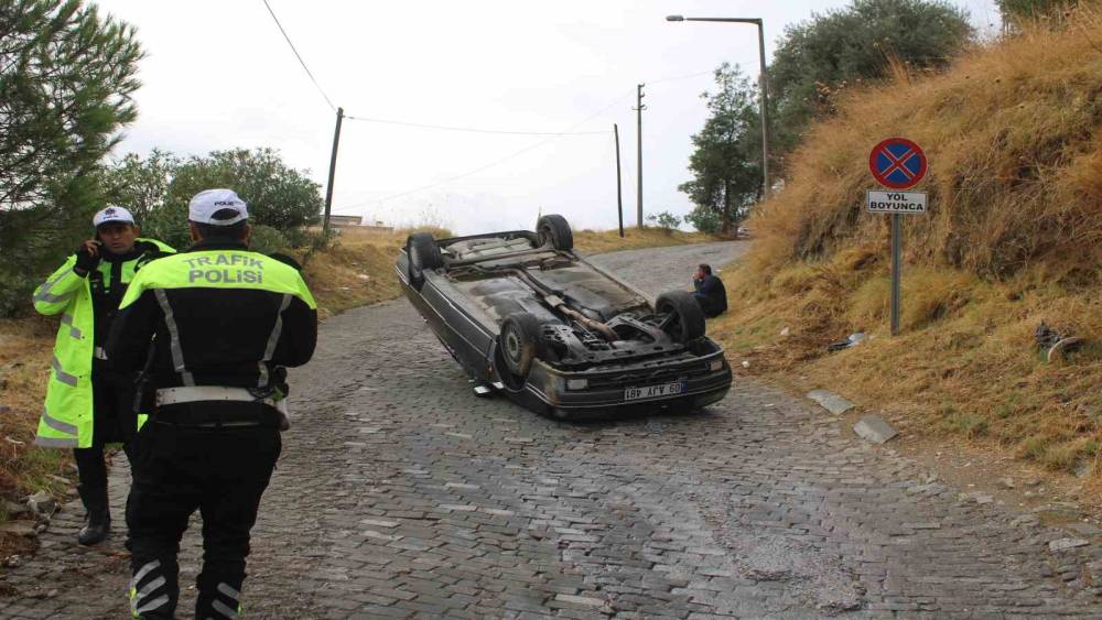 Freni tutmayan otomobil takla attı
